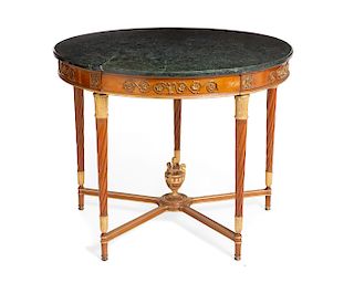 A Louis XVI style fruitwood center table