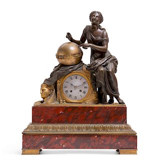 A French  bronze and rouge marble mantel clock