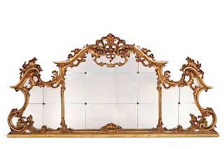 A Continental Rococo style giltwood mirror