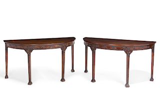 A pair of George III style mahogany side tables