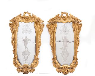 A pair of Italian Baroque giltwood and acid etched mirrors