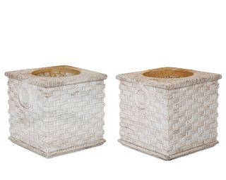 A pair of carved marble basket weave jardinieres