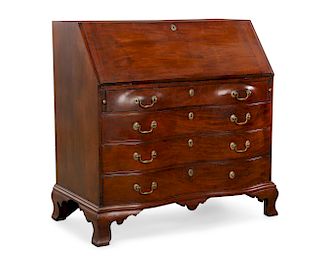 A Chippendale mahogany oxbow slant front desk