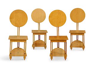 A set of four laminated oak lollipop chairs