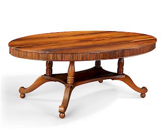 An Anglo-Indian exotic hardwood oval dining table
