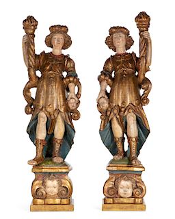 A pair of Spanish Baroque figural prickets