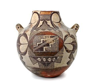 An Acoma Olla, Height 10 1/2 x diameter 9 inches.