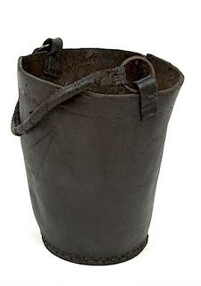 FIRE BUCKET FROM THE WRECK OF THE HMS INVINCIBLE (1758) 

Leather water or fire bucket with original leather-covered, rope handle fr...