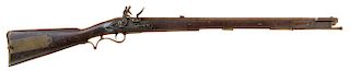 A SERVICE PATTERN 1800 BAKER RIFLE AND SWORD BAYONET 

An early (1802-1806) issue rifle with leaf-sighted, 30 ¼ in. L barrel of 0.62...