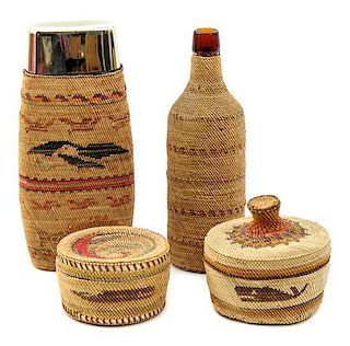 A Group of Four Nuu-chah-nulth/ Makah Baskets Height of tallest 9 7/8 inches.
