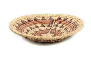 Two Navajo Wedding Baskets Height of largest 3 1/2 x diameter 18 1/2 inches.
