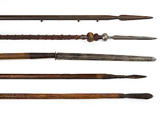 A GROUPING OF FIVE VARIOUS POLEARMS 

Five polearms, consisting of a late 19th c. European steel-shafted (2-piece) cavalry lance; an...
