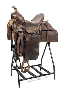 An R. T Fraizer Saddle, Pueblo, Colorado Seat size 14 1/4 inches.