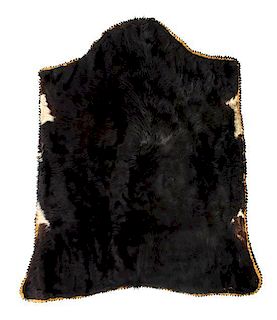A Vintage Black Cow Hide Carriage/Sleigh Lap Robe 63 x 60 inches.