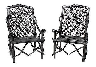 A Pair of Painted Rhododendron Arm Chairs Height 39 x width 26 x depth 23 inches.