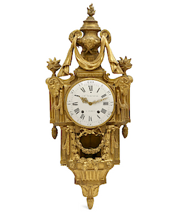 A Louis XVI gilt bronze cartel clock, Ch Baltazar