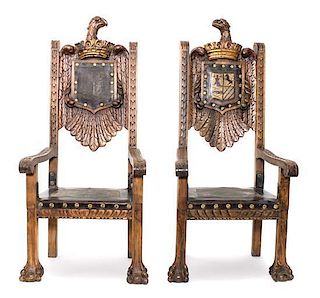 A Pair of Carved Wood and Leather Throne Chairs Height 63 x width 27 3/4 x depth 24 1/2 inches.