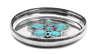 A Silver and Turquoise Tray, Edison Begay Diameter 4 3/4 inches.