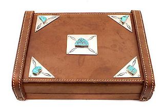A Navajo Silver, Turquoise and Leather Box, Edison Begay Height 2 3/4 x width 10 1/4 x depth 7 3/4 inches.