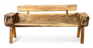 A Rustic American Carved Wood Hall Bench Height 33 x length 74 3/4 x depth 16 inches.