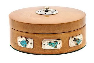 A Navajo Silver, Turquoise and Alder Wood Box, Edison Begay Height 3 x diameter 6 1/4 inches.