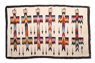 Two Navajo Rugs First: 38 3/4 x 59 inches.