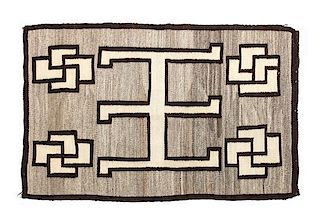 Four Navajo Rugs First: 53 x 32 inches.