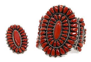 A Zuni Silver and Coral Cluster Bracelet and Ring, Bernice Wyaco Length 5 3/8 x opening 7/8 x width 2 7/8 inches.