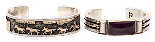 Two Southwestern Silver and 14 Karat Gold Bracelets Length of first 5 1/2 x opening 1 1/8 x width 5/8 inches.