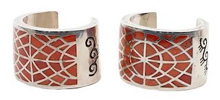 A Pair of Navajo Hollow Silver, Spondylus Coral Cuff Bracelets, J. Begay Length of each 5 1/8 x opening 1 1/4 x width 1 3/4 inch