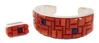 A Southwestern Style Coral and Lapis Mosaic Inlay Cuff Bracelet Length 5 1/2 x opening 1 x width 7/8 inches.