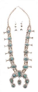 A Southwestern Style Squash Blossom Necklace Length 26 inches; naja 3 x 3 1/2 inches.