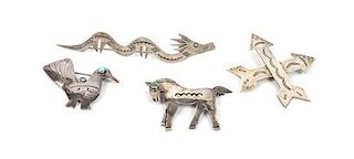A Group of Four Southwestern Silver Brooches Length of largest 4 inches.
