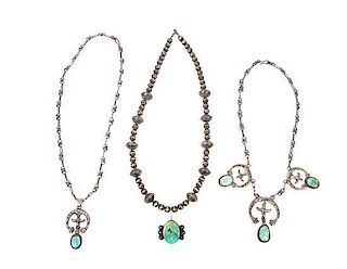Three Silver and Turquoise Medallion Necklaces Length of first 20 inches.
