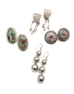 Four Pairs of Southwestern Silver Earrings Height of the first 1 1/2 x width 1 inches.