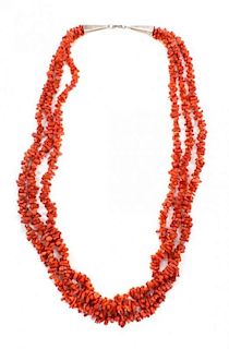A Southwestern Triple Strand Branch Coral Necklace Length 27 1/2 inches.