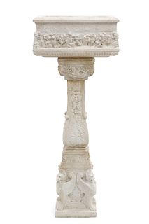 A Classical style carved marble jardiniere
