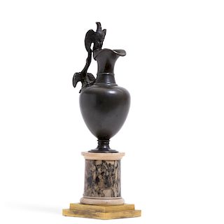Italian patinated bronze ewer on marble pedestal