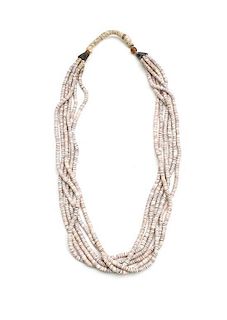 A Southwestern Six Strand Shell Heishi Necklace Length 26 inches.
