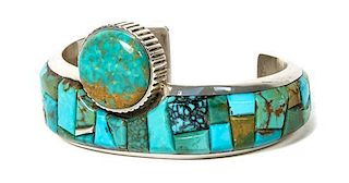 A Navajo Silver and Turquoise Inlay Cuff Bracelet, James McCabe Length 5 7/8 x opening 1 1/8 x width 1 1/2 inches.