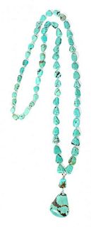 A Turquoise Nugget Necklace Length 44 inches.