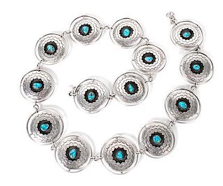 A Southwestern Silver, Turquoise and Branch Coral Concha Belt Length 32 inches.
