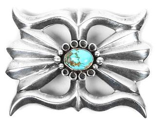 A Navajo Cast Silver and Turquoise Belt Buckle, Ben Murphy Height 2 1/2 x 3 inches.