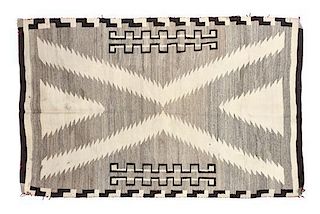 A Navajo Rug 60 x 40 inches.