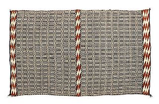 Four Navajo Weavings Largest: 47 x 31 1/2 inches.