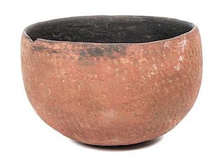 A Prehistoric Corrugated Redware Bowl Height 4 1/4 x diameter 6 1/4 inches.