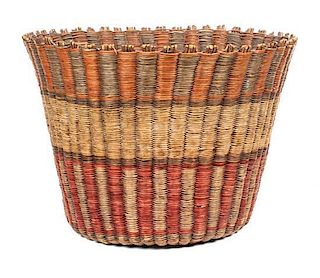 A Group of Three Southwestern Baskets Height of first 10 x diameter 14 inches.