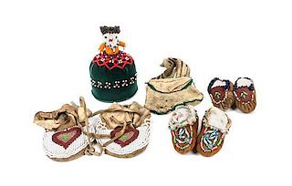 A Group of Southeastern Beadwork Articles Height of puzzle bag 7 x width 3/4 inches.