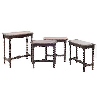 Lote de 4 mesas consolas. Siglo XX. En talla de madera. Con cubiertas irregulares y soportes tipo bollo. 74 x 70 x 36 cm. (mayor)