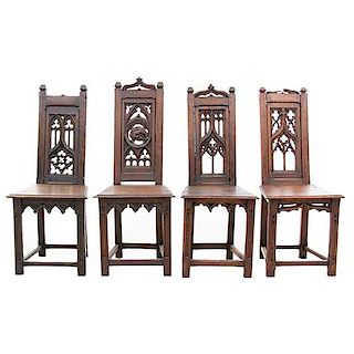 Lote de 4 sillas. Francia. Siglo XX. Estilo Gótico. En talla de madera de roble. Con respaldos semiabiertos, fustes acanalados.